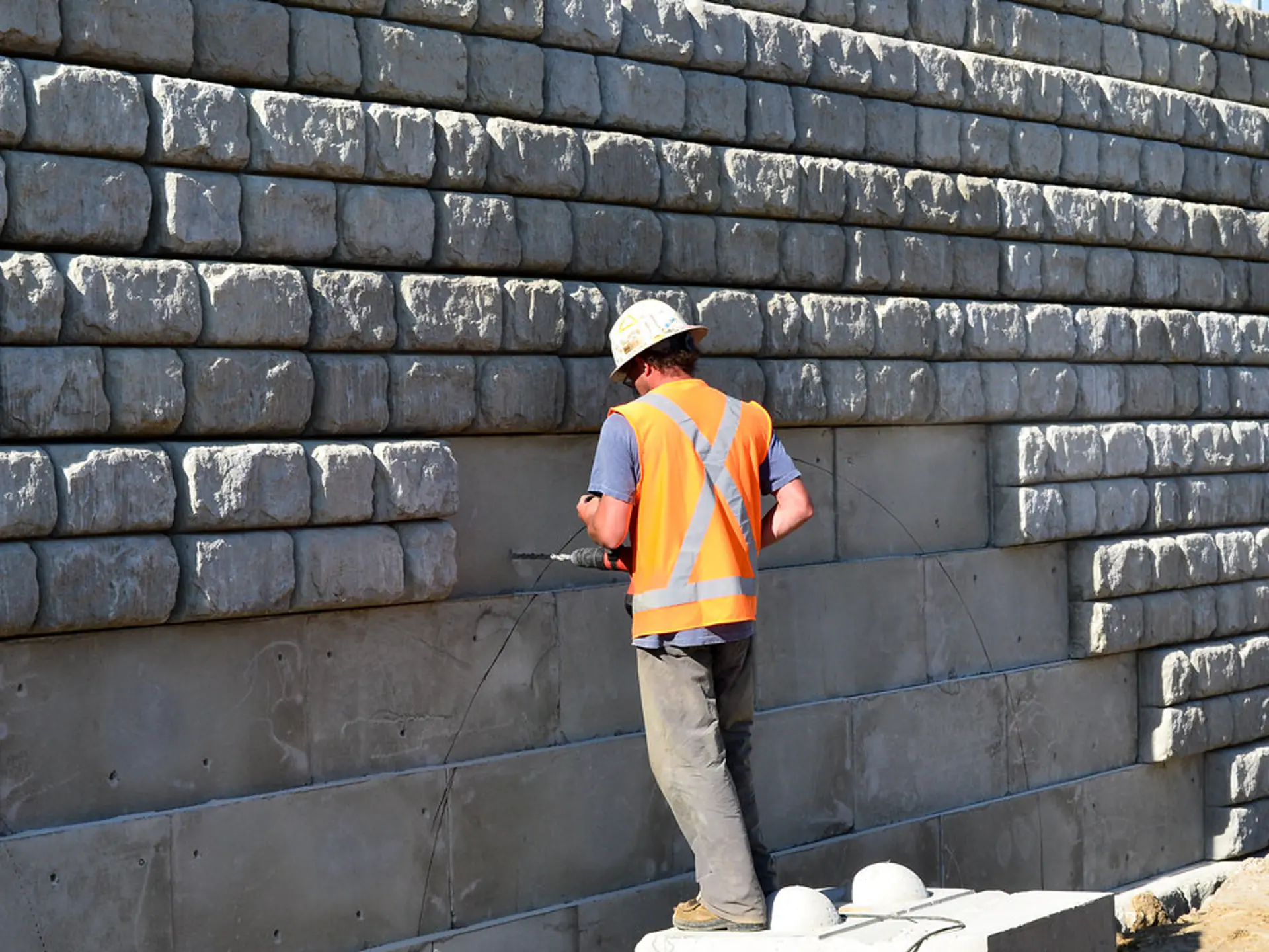 Precast concrete retaining wall system engineered for a hillside site in Vestal, NY