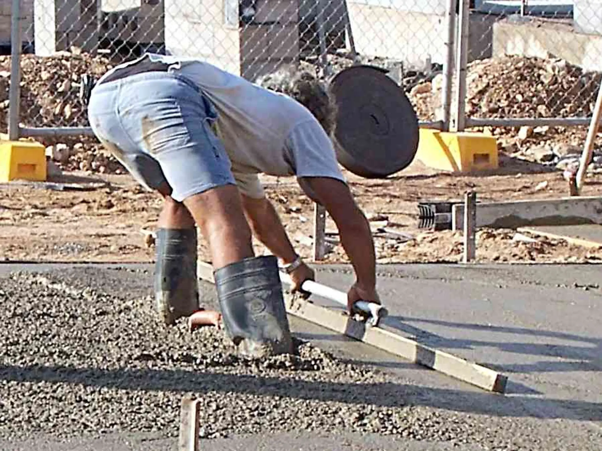 Binghamton Concrete Co crew screeding a concrete slab in Binghamton, NY